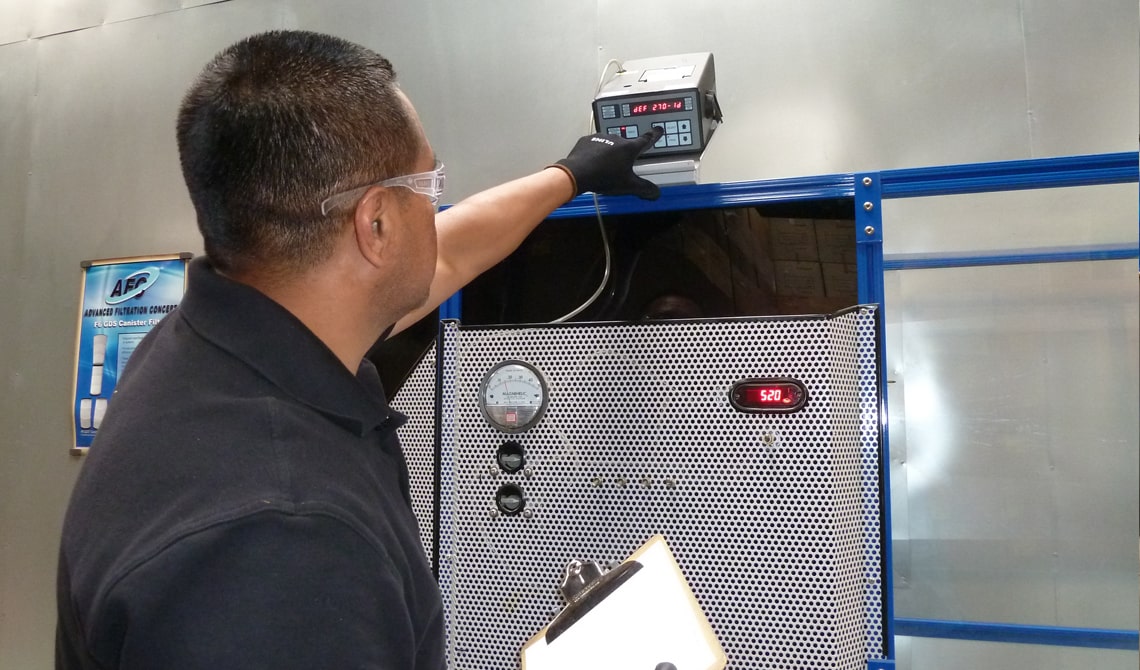 AFC service tech testing air filters