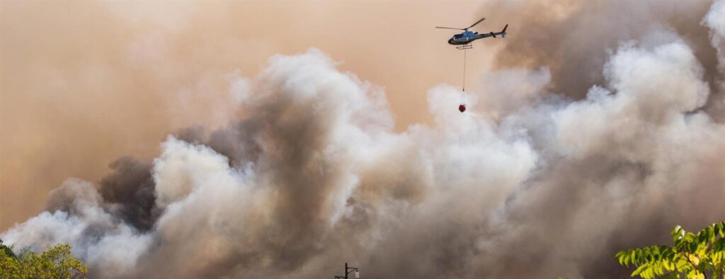 Helicopter helping with wildfire and smoke
